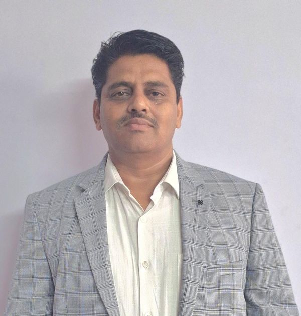 Portrait of Dr. Rajkamal Jain, Principal